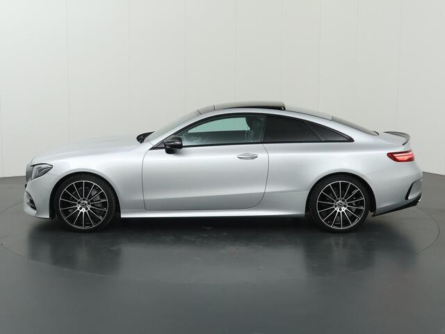 Mercedes-Benz E-KLASSE Coupé 200 Premium Plus | AMG | Night | Panoramadak | Memory | Burmester | Rijassistentiepakket | Lederen bekleding | 20" lichtmetalen velgen |