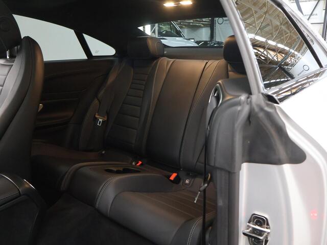 Mercedes-Benz E-KLASSE Coupé 200 Premium Plus | AMG | Night | Panoramadak | Memory | Burmester | Rijassistentiepakket | Lederen bekleding | 20" lichtmetalen velgen |