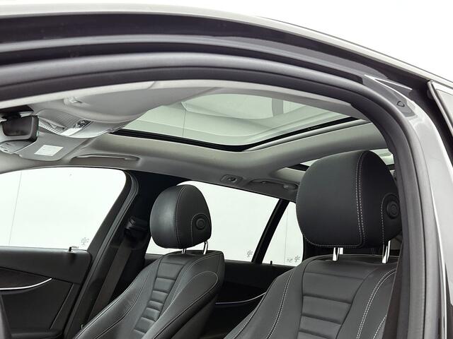 Mercedes-Benz E-estate 300 e Business Solution AMG | Panoramadak | Wide screen | Navigatie | Elect. bedinebare voor stoelen met geheugen | Parking support met camera achter | Inclusief 24 maanden Mercedes-Benz Certified garantie voor Europa.
