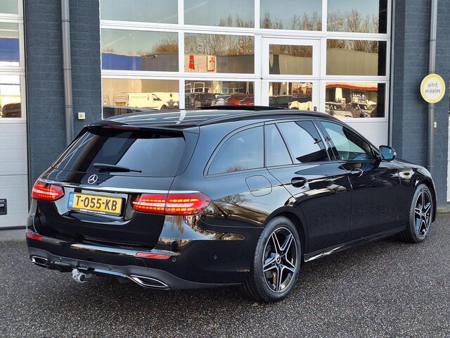 Mercedes-Benz E-estate 200 | Panoramadak | 360° Camera | AMG | Trekhaak | Night pakket | Stoelverwarming | Elektrische achterklep