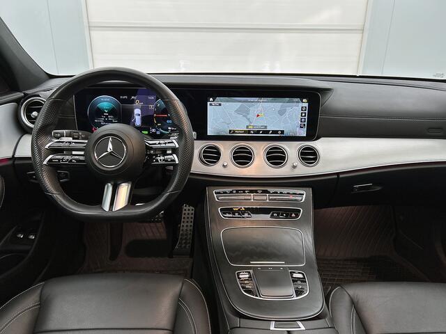 Mercedes-Benz E-estate 300 e AMG-line | Panorama schuif/kanteldak | Trekhaak af fabriek wegklapbaar | Lederen bekleding | Alarm SCM3 | 360gr Camera | Inclusief 24 maanden Mercedes-Benz Certified garantie voor Europa.