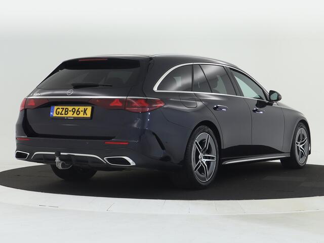 Mercedes-Benz E-estate 300 e AMG Plug-In Hybride | AMG Styling | Trekhaak | Digital light | Keyless go | Distronic | Keyless go | Memory Pakket voorsteoelen. Inclusief 24 maanden MB Certified garantie voor Europa.