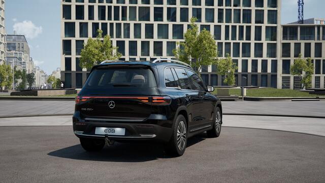Mercedes-Benz EQB 250+ Business Solution Luxury 71 kWh | Trekhaak | Parkeerpakket met achteruitrijcamera | EASY PACK achterklep | Dodehoekassistent | Extra USB-poorten | Verwarmde stoelen vooraan | Spiegelpakket | Sfeerverlichting |