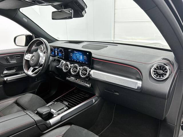 Mercedes-Benz EQB 300 4MATIC AMG Line 7p. 67 kWh 7 Persoons | AMG Line | Panorama Schuif-Kanteldak | Head-up display | Parkeerpakket met 360°-camera | Alarm. AMG Styling | Electr Stoelen met geheugen | 7- persoons | sfeerverlichting