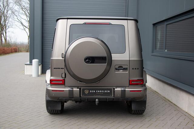 Mercedes-Benz G-KLASSE - 63 AMG 585PK | Burmester 3D | Massage + Ventilatie | Akrapovic | 360 Camera | Carbon | IWC | Lane & Side Assist | MBUX | TH 3500kg | 22"| Manufaktur | Ambiance | Garageopener | N.P ¤275.681,-