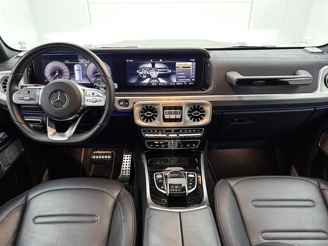 Mercedes-Benz G-KLASSE 500 Trekhaak | AMG Line | Night Pakket | Schuif-Kanteldak | Distronic | Treeplanken van rvs links en rechts. Inclusief 24 maanden Mercedes-Benz Certified garantie voor Europa.