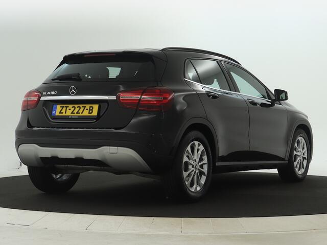Mercedes-Benz GLA-KLASSE 180 Business Solution Style | Keyless Go | Stoelverwarming | Parkeerpakket met Camera | LED | Cruise Controle | Inclusief 24 maanden Mercedes-Benz Certified garantie voor Europa.