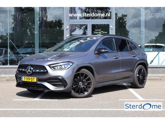 Mercedes-Benz GLA-KLASSE 180 AMG Line l Automaat I Achteruitrij camera l Tempomaat l Stoelverwarming l Sfeerverlichting l MBUX l Widescreen l Keyless Go l Night pakket l Spiegel pakket l l Camera l Carbon inleg l Draadloos opladen telefoon l LED High Performance koplampen l THERM