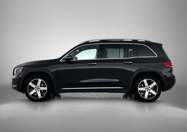 Mercedes-Benz GLB-Klasse 200 automaat Luxury 7-persoons | Trekhaak | Panorama schuifdak | MultiBeam Led | Lederlook + Memory Seats | Keyless Go| 360gr camera | Inclusief 24 maanden Mercedes-Benz Certified garantie voor Europa.