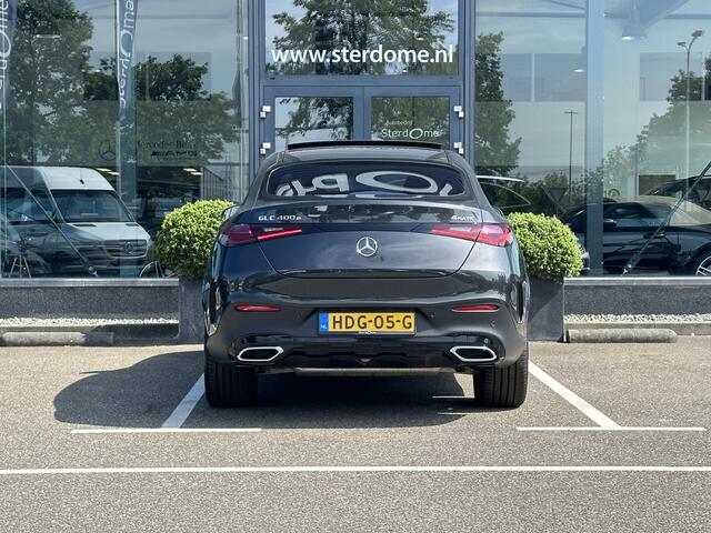 Mercedes-Benz Glc Coupé 400e 4MATIC AMG Line l Panoramadak l MBUX l Niveau regeling l Multibeam LED l Rij- assistentie pakket met Distronic l Keyless l Zwart Leder l Memory pakket l Burmester l Sfeerverlichting l THERMOTRONIC l Smartphone integratie pakket l Night pakket l Alarm