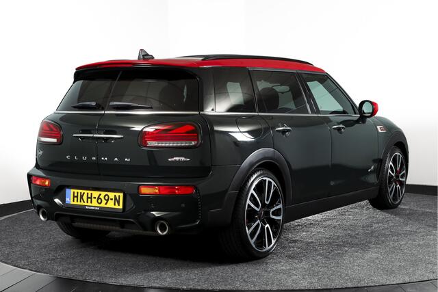 Mini CLUBMAN 2.0 JCW ALL4 Chili | S/K-Panodak | Adapt. Cruise | Stoelverw. | PDC | Camera | NAV + App.Connect | ECC | Harman Kardon | LM 19" |