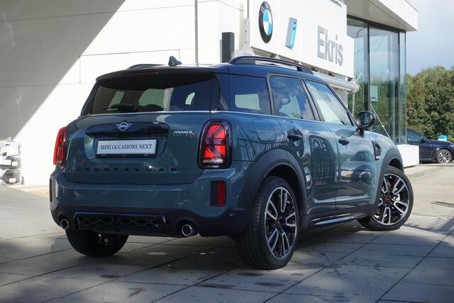 Mini COUNTRYMAN Cooper S Hammersmith | Serious Business | Glazen panoramadak | Comfortstoelen | John Cooper works Aerodynamic Kit | Piano Black Exterior pack | Harman-Kardon | Head-Up Display | 19 inch LMV
