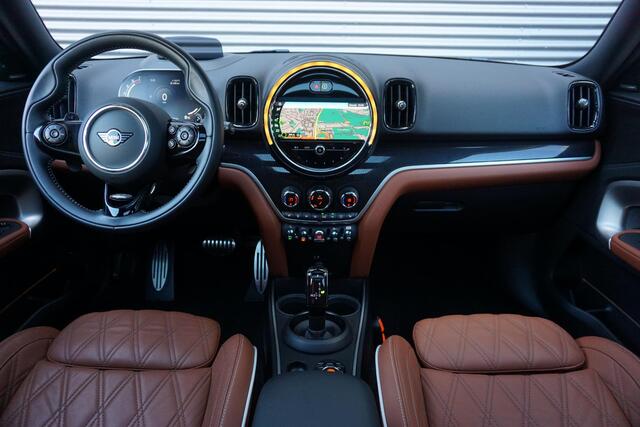 Mini COUNTRYMAN Cooper S Hammersmith | Serious Business | Glazen panoramadak | Comfortstoelen | John Cooper works Aerodynamic Kit | Piano Black Exterior pack | Harman-Kardon | Head-Up Display | 19 inch LMV