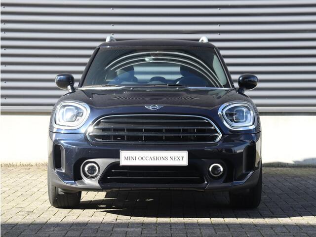 Mini COUNTRYMAN Cooper | Younique Trim + Comfort Plus Pakket + Trekhaak + Driving Assistant + Apple Carplay + Camera + Stuurwielverwarming + Comfort Acces + 18'' Pair Spoke