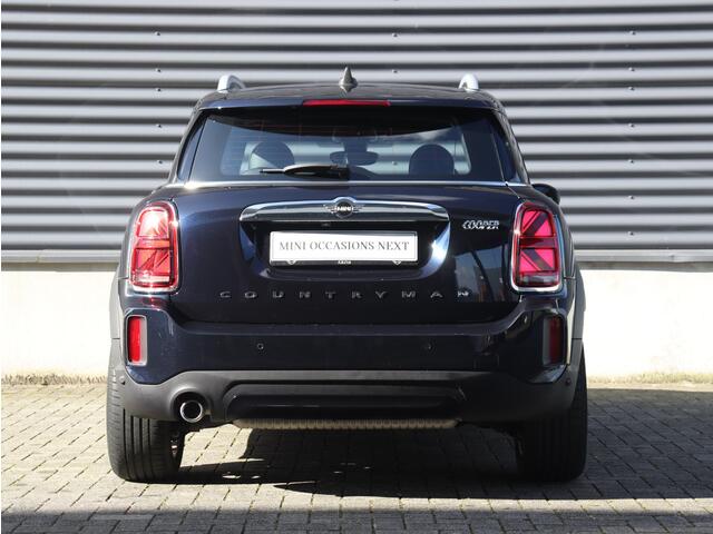 Mini COUNTRYMAN Cooper | Younique Trim + Comfort Plus Pakket + Trekhaak + Driving Assistant + Apple Carplay + Camera + Stuurwielverwarming + Comfort Acces + 18'' Pair Spoke
