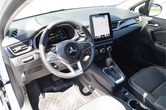 Mitsubishi ASX HEV 1.6 A/T FIRST EDITION | HYBRIDE | NAVI | ALL SEASON BANDEN | ADAPTIEF CRUISE | STOEL + STUUR VERWARMING | FABRIEKSGARANTIE TOT 14-03-2032* | ALL IN RIJKLAARPRIJS