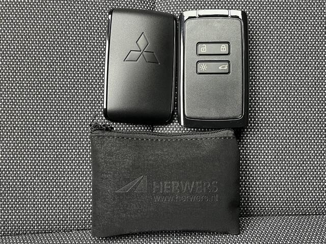 Mitsubishi ASX 1.8 HEV AT Intense+ / ¤ 2.000,- Voordeel op de Nieuwprijs / 8 Jaar Fabrieksgarantie / Achteruitrijcamera / Stuur- en Stoelverwarming / Voorruitverwarming / Keyless Entry & Start / Navigatie via Apple Carplay & Android Auto / Adaptieve Cruise Control / Cl