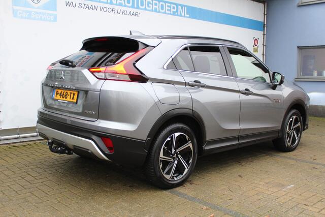 Mitsubishi ECLIPSE Cross 2.4 PHEV Intense+ | Incl. 12 maanden Garantie | Climate controle | Achteruitrijcamera | Stoelverwarming | Navigatie | Parkeersensoren V+A | Trekhaak | Bestuurdersstoel elektrisch verstelbaar | Keyless entry/start | Cruise controle | Lane assist | DA