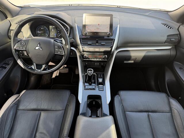 Mitsubishi ECLIPSE Cross 2.4 PHEV Instyle / Fabrieksgarantie tot 05-2030 / Dealer Onderhouden / Schuif Kantel Dak / Camera / Navigatie / Adaptieve Cruise / ApplecarPlay & Android Auto / Lederen Bekleding / Stoel Verwarming / Elektr. Stoelen / Stoel Verwarming /