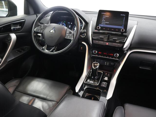 Mitsubishi ECLIPSE Cross 2.4 PHEV Prestige | Trekhaak | Panoramadak | Lederen Interieur | Navigatie | Ele.verstelbare stoelen | Stoelverwarming/Stuurverwarming | Camera | DAB | Adaptieve Cruise Control |