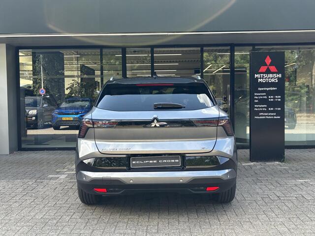 Mitsubishi ECLIPSE Cross Intense 87 kWh NIEUW UIT VOORRAAD LEVERBAAR | Warmtepomp | Apple CarPlay & Android Auto | Adaptieve Cruise Control | Verwarmbare voorstoelen | Elektrisch bedienbare achterklep | Navigatiesysteem | 8 jaar fabrieksgarantie