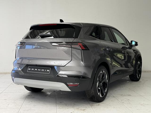 Mitsubishi GRANDIS 1.8 HEV Intense+ NIEUW UIT VOORRAAD LEVERBAAR | Verwarmbare voorstoelen | Parkeersensoren voor- en achter | Sfeerverlichting | Regensensor | Adaptieve Cruise Control | Verwarmbaar Stuurwiel | Apple CarPlay & Android Auto | 8 jaar fabrieksgarantie