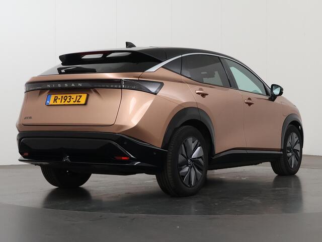 Nissan Ariya Evolve 91 kWh | Luxe bekleding | Apple Carplay/Android Auto | HUD | Panoramadak | 360 camera | Dodehoek detectie | Cruise control Adaptief | Warmtepomp |