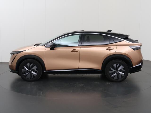 Nissan Ariya Evolve 91 kWh | Luxe bekleding | Apple Carplay/Android Auto | HUD | Panoramadak | 360 camera | Dodehoek detectie | Cruise control Adaptief | Warmtepomp |