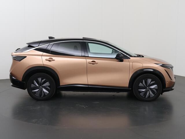 Nissan Ariya Evolve 91 kWh | Luxe bekleding | Apple Carplay/Android Auto | HUD | Panoramadak | 360 camera | Dodehoek detectie | Cruise control Adaptief | Warmtepomp |