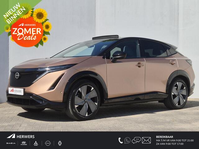 Nissan Ariya e-4ORCE Evolve+ Pack 91 kWh Automaat / Vision Tech / HUD / Trekgewicht 1500 kg / Glazen schuif- en kanteldak / Bose Audio Systeem / Stuur-, Stoel en Achterbankverwarming / Rondomzicht camera / Elektrische achterklep /