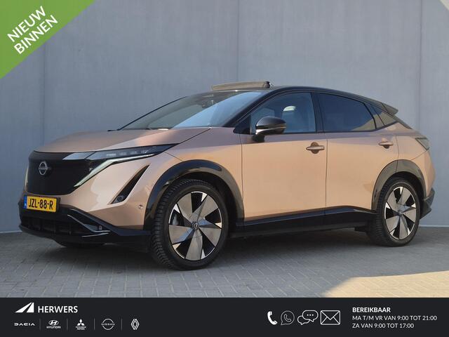 Nissan Ariya e-4ORCE Evolve+ Pack 87 kWh Automaat / Accu SOH 99% / Fabrieksgarantie tot 07-2027 / CCS snelladen / WLTP bereik 498 km bereik stad 612 km / Head Up Display / Glazen schuif- en kanteldak / Stuur-, Stoel & Achterbank verwarming / Elektrische achterklep / S