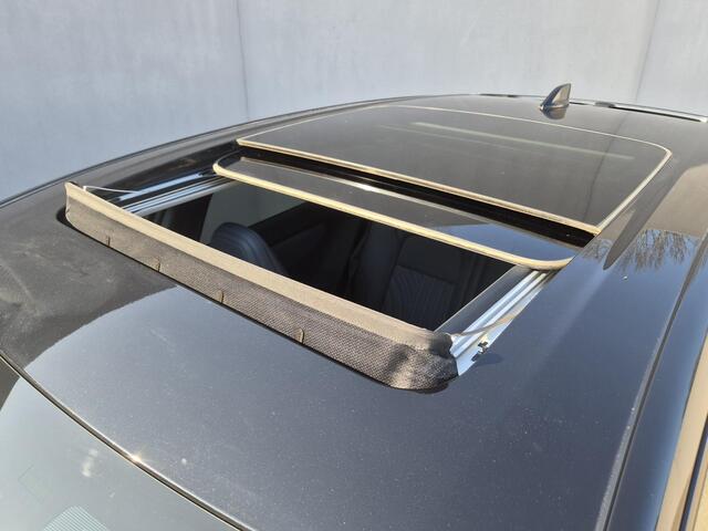 Nissan Ariya e-4ORCE Evolve+ Pack 87 kWh Automaat / Accu SOH 99% / Fabrieksgarantie tot 07-2027 / CCS snelladen / WLTP bereik 498 km bereik stad 612 km / Head Up Display / Glazen schuif- en kanteldak / Stuur-, Stoel & Achterbank verwarming / Elektrische achterklep / S