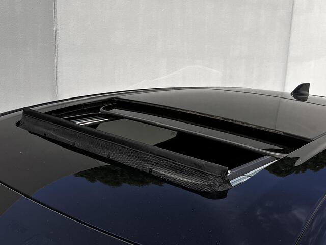 Nissan Ariya Evolve 91 kWh Dealer onderhouden / Accu SoH 99 % / Panorama schuifdak / HUD / Navigatie / Apple Carplay Android / Elektrische stoelen & klep / BOSE / Stoelventilatie / Stoel-, stuur- en achterbankverwarming / 20" LM wielen /