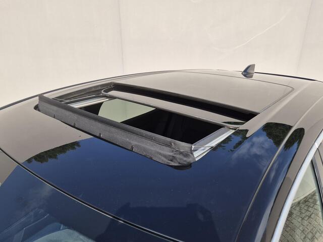 Nissan Ariya Evolve 66 kWh / 99% SOH / Glazen schuif- en kanteldak / CCS snelladen / warmtepomp / Stuur- Stoel & Achterbank verwarming / Head Up Display / Adaptief cruise control / Stoelventilatie / Bose Audio Systeem / Elektrische achterklep / Draadloze telefoon lad