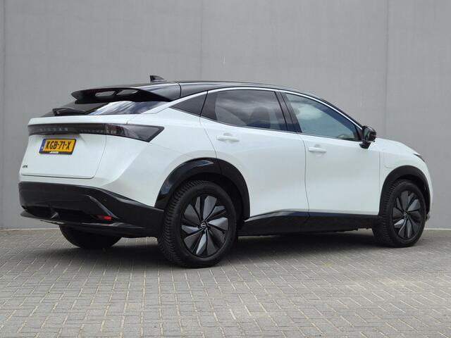 Nissan Ariya Advance 91 kWh / SOH 100% / Fabrieksgarantie tot 04-2028 / All season banden / CCS snelladen / Head Up Display / Elektrische achterklep / Warmtepomp / Stuur- Stoel & Voorruit verwarming / Rondomzicht camera / Adaptief cruise control / Bose Audio Systeem /