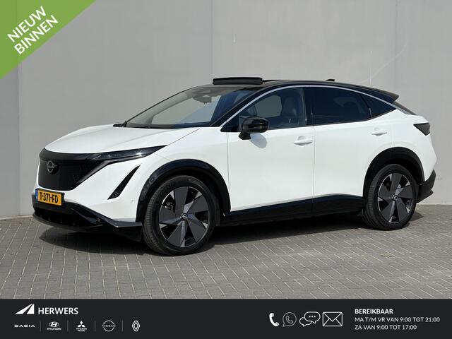 Nissan Ariya Evolve 91 kWh / Stoelverwarming voor en achter / Schuif-kantel dak / Stoelventilatie / Stuurverwarming / 100% dealer onderhouden / Elektrisch verstelbare stoelen met geheugen / Elektrische achterklep / Adaptieve cruise control