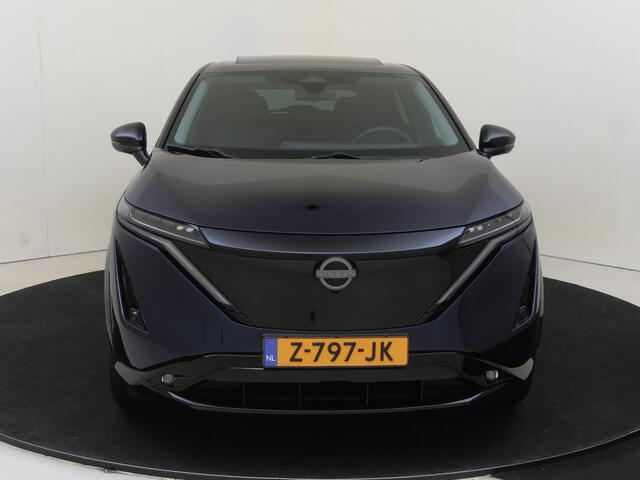 Nissan Ariya Evolve 91 kWh | Apple Carplay/Android | cruise control adaptief | elektrisch glazen panorama-dak | lederen/microvezel bekleding | navigatiesysteem full map | voorstoelen verwarmd en geventileerd | warmtepomp | lichtmetalen velgen |