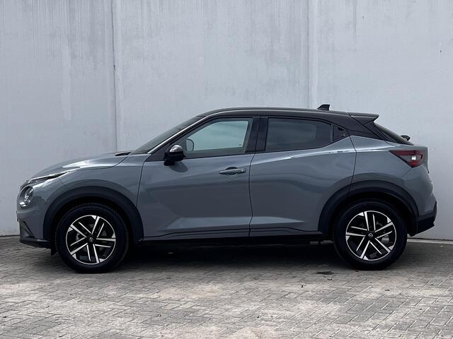 Nissan JUKE 1.0 DIG-T N-Connecta DCT Automaat / Cold pack / Allseason banden / Apple Carplay Android Auto / 17" LM wielen / Achteruitrijcamera / Stuur-, Stoel en voorruitverwarming / Navigatie / Climate control /