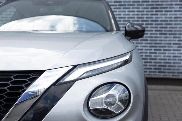 Nissan JUKE 1.0 DIG-T 116 Premiere Edition | Two-Tone | Achteruitrijcamera | Parkeersensoren | Stoelverwarming | Verwarmde Voorruit | Keyless Entry | LED Koplampen | Navigatie | Apple Carplay | Android Auto | Lichtmetalen Velgen 19 inch