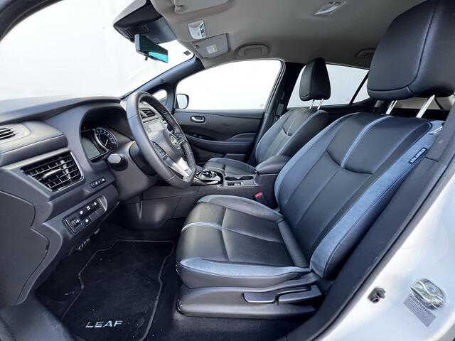 Nissan LEAF e+ Tekna 59 kWh Automaat / Accu SoH 97% / Pro Pilot Adaptieve CC / Dode hoek detectie / Navigatie / Camera 360° / Leer / Apple Carplay Android / Stuur-, stoel- en achterbankverwarming /