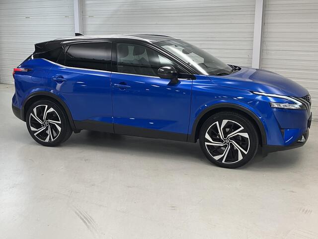 Nissan QASHQAI 1.3 MHEV Xtronic Tekna Plus / Eerste Eigenaar / Dealer Onderhouden / Afneembare Trekhaak 1800 KG / Lederen Bekleding / Bose Audio / Navigatie / Panoramadak / 360 Graden Camera / Elektrische Kofferbak / Elektrisch Verstelbare Stoel met Geheugen /