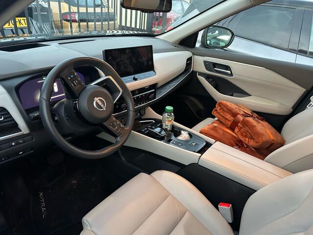 Nissan X-TRAIL 1.5 e-Power Tekna Automaat | Navigatie | Carplay | Half stof/leder interieur (lichtgrijs) | 1e Eigenaar | NL auto