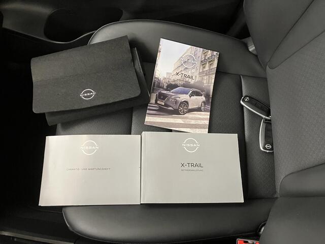 Nissan X-TRAIL 1.5 MHEV 163pk 5-Zits Tekna Automaat / 2000 KG Trekgewicht / Navigatie / 360 Graden Camera / Stoel- en Stuurverwarming / Verwarmde Voorruit / Fabrieksgarantie tot 07-2027 / Elektrische Kofferbak / Elektrische Stoelen met Geheugen /