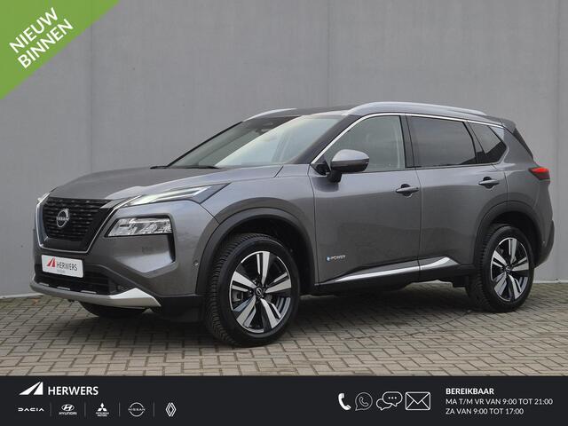 Nissan X-TRAIL 1.5 e-4orce Tekna 4WD Automaat / Fabrieksgarantie tot 05-2027 / Allseason banden / Trekgewicht 1.800 Kg / Head Up Display / Stuur-, Stoel en Achterbank verwarming / Adaptief CC / Elektrische achterklep /