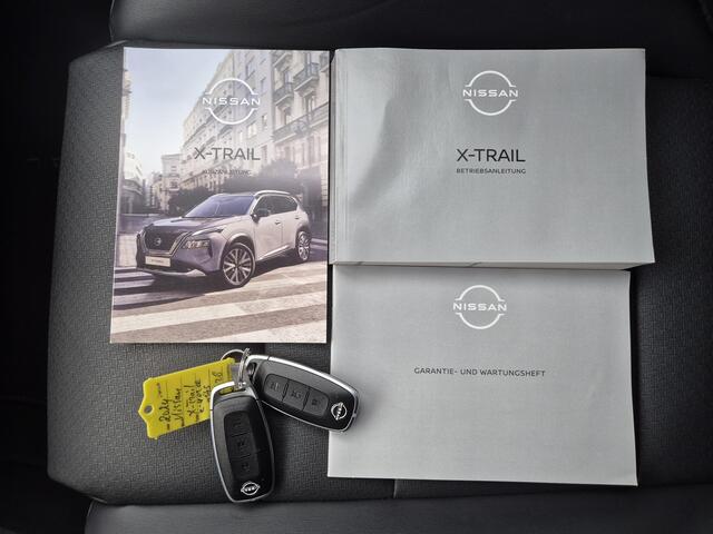 Nissan X-TRAIL 1.5 e-4orce Tekna 4WD Automaat / Fabrieksgarantie tot 05-2027 / Allseason banden / Trekgewicht 1.800 Kg / Head Up Display / Stuur-, Stoel en Achterbank verwarming / Adaptief CC / Elektrische achterklep /