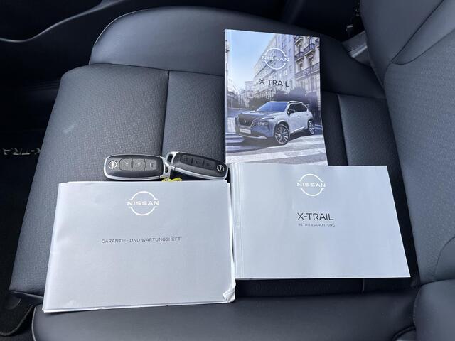 Nissan X-TRAIL 1.5 e-4orce Tekna 4WD Automaat / Fabrieksgarantie tot 10-2027 / 1.800 kg trekgewicht / Navigatie / Elektr. stoelen en klep / Stuur-, stoel- en achterbankverwarming / HUD / Camera 360° / 19" LM wielen met All Season banden /