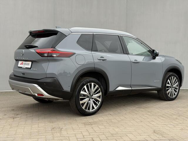 Nissan X-TRAIL 1.5 e-Power Tekna / Fabrieksgarantie tot 3-2028 / Dealer Onderhouden / HUD / 360 Camera / Lederen Bekleding / Adaptieve Cruise / Elektr. Stoelen + Memory / Elektr. Achterklep / Dodehoek Detectie / DAB / LED /