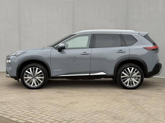 Nissan X-TRAIL 1.5 e-Power Tekna / Fabrieksgarantie tot 3-2028 / Dealer Onderhouden / HUD / 360 Camera / Lederen Bekleding / Adaptieve Cruise / Elektr. Stoelen + Memory / Elektr. Achterklep / Dodehoek Detectie / DAB / LED /