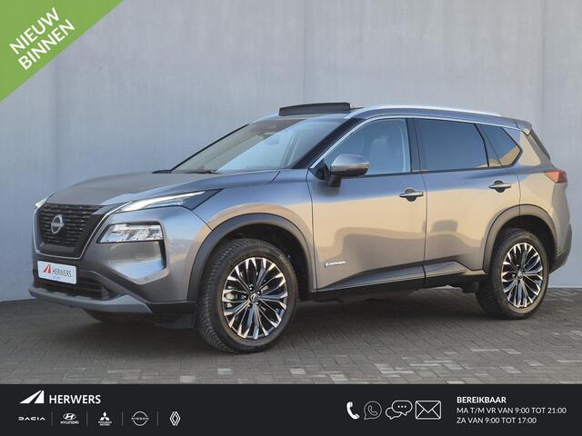 Nissan X-TRAIL 1.5 e-Power Tekna Automaat / Fabrieksgarantie tot 04-2028<100.000 / All season banden / Head Up Display / Elektrische achterklep / Glazen schuif- en kanteldak / Stuur-, Stoel & Achterbank verwarming / Adaptief cruise control /