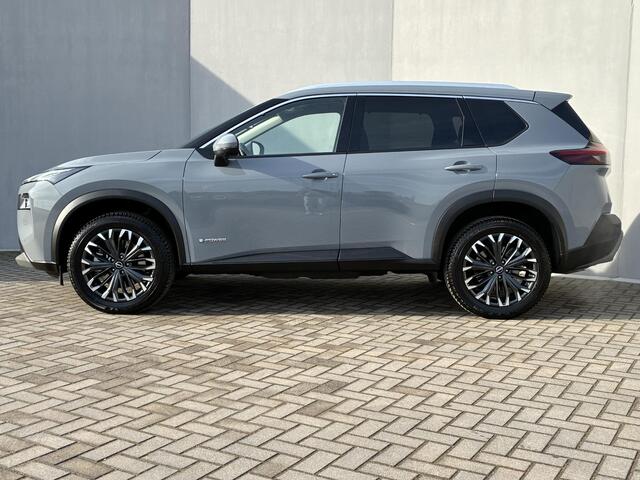 Nissan X-TRAIL 1.5 e-Power Tekna / Fabrieksgarantie t/m 05-2028 / Apple Carplay/Android Auto / Adaptieve Cruise Control / Stoel-/Stuur-/Voorruitverwarming / Elektrische Achterklep / All-Season banden / Navigatie / Achteruitrijcamera /